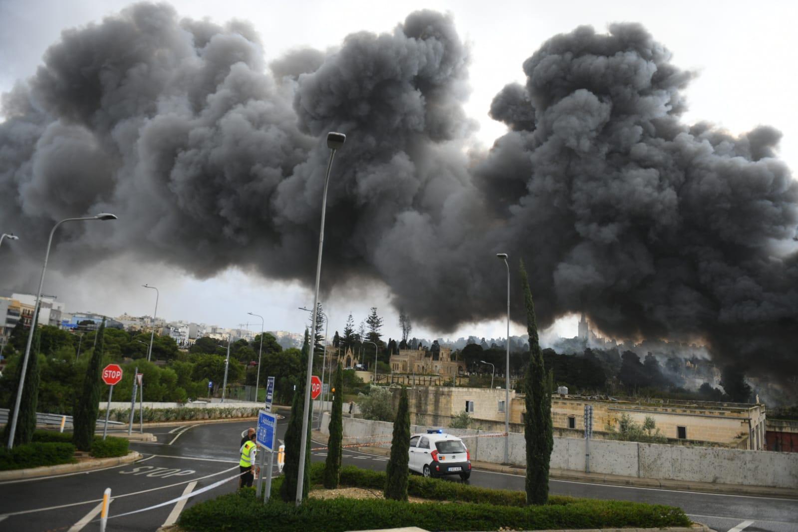 Smoke rises over Addolorata Cemetery.