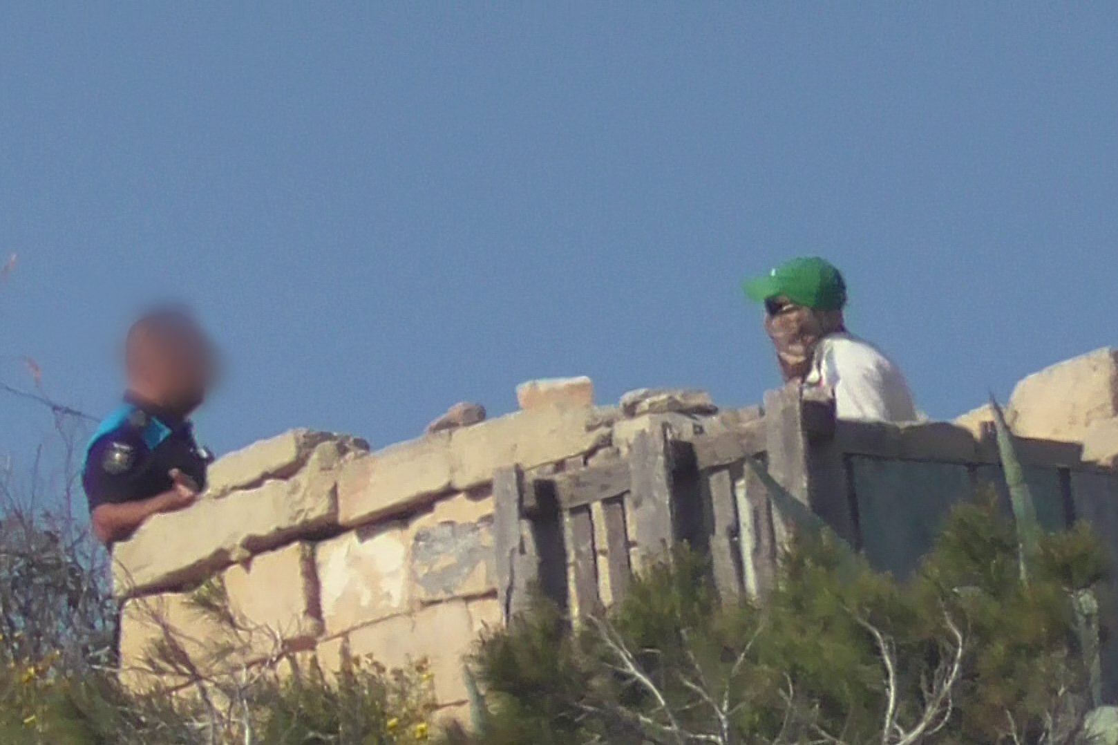 EPU officer confronts masked hunter at Xgħajra on April 18. Photo: BirdLife Malta