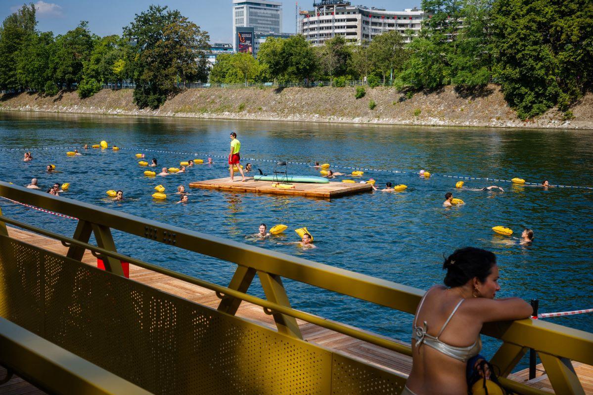 People swim at the Grenelle safe bathing site on the Seine river on its opening day, in front of the Eiffel Tower in Paris on July 5. Photo: Julien De Rosa/AFP