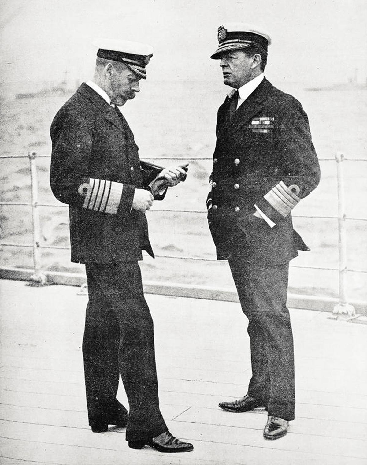 King George V (left) and Admiral Beatty conversing on the deck of a warship, 1918. Auckland Libraries Heritage Collections, New Zealand