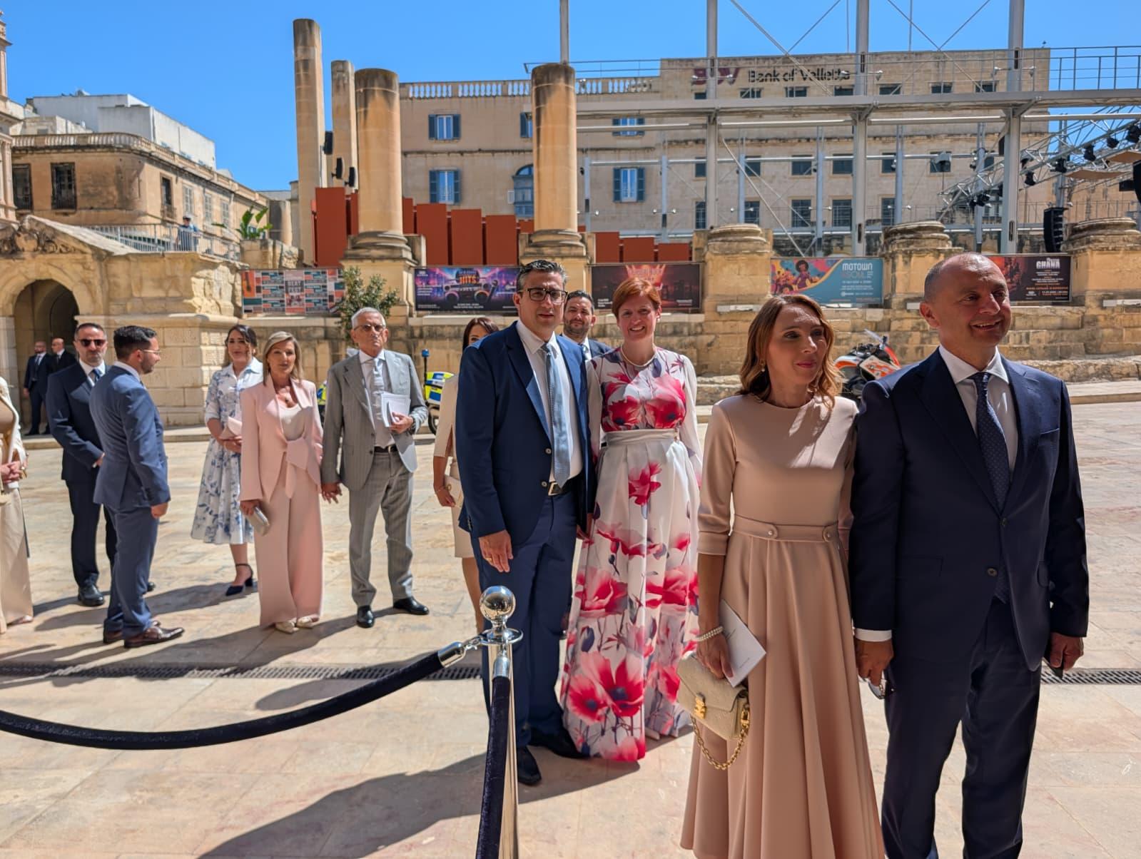 MPs led by Andy Ellul and Malcolm Paul Agius Galea line up to get into parliament along with their partners. Photo: Chris Sant Fournier