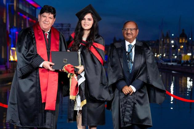 Afghan woman who fled Taliban graduates in Malta