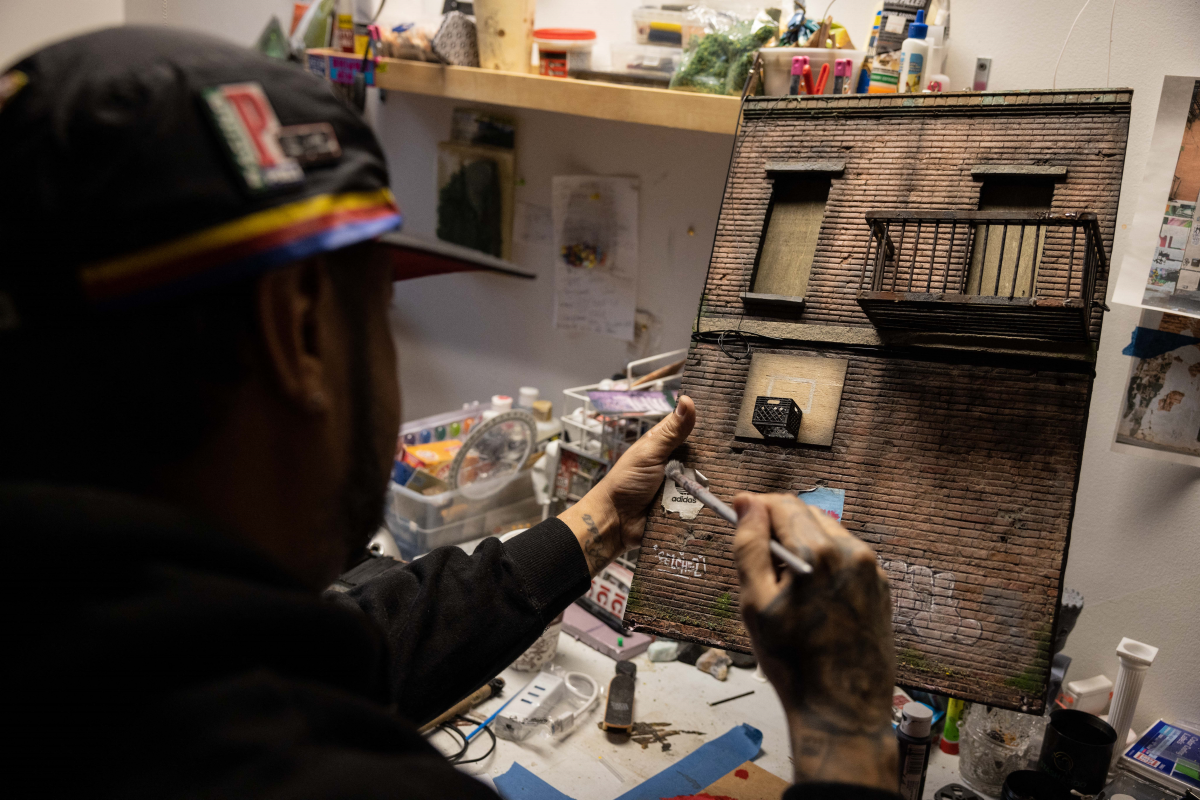 Danny Cortes works on a new miniature at his studio in the Brooklyn borough of New York City.