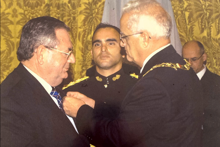 Being awarded <em>Ġieħ ir-Repubblika</em> by President Eddie Fenech Adami.