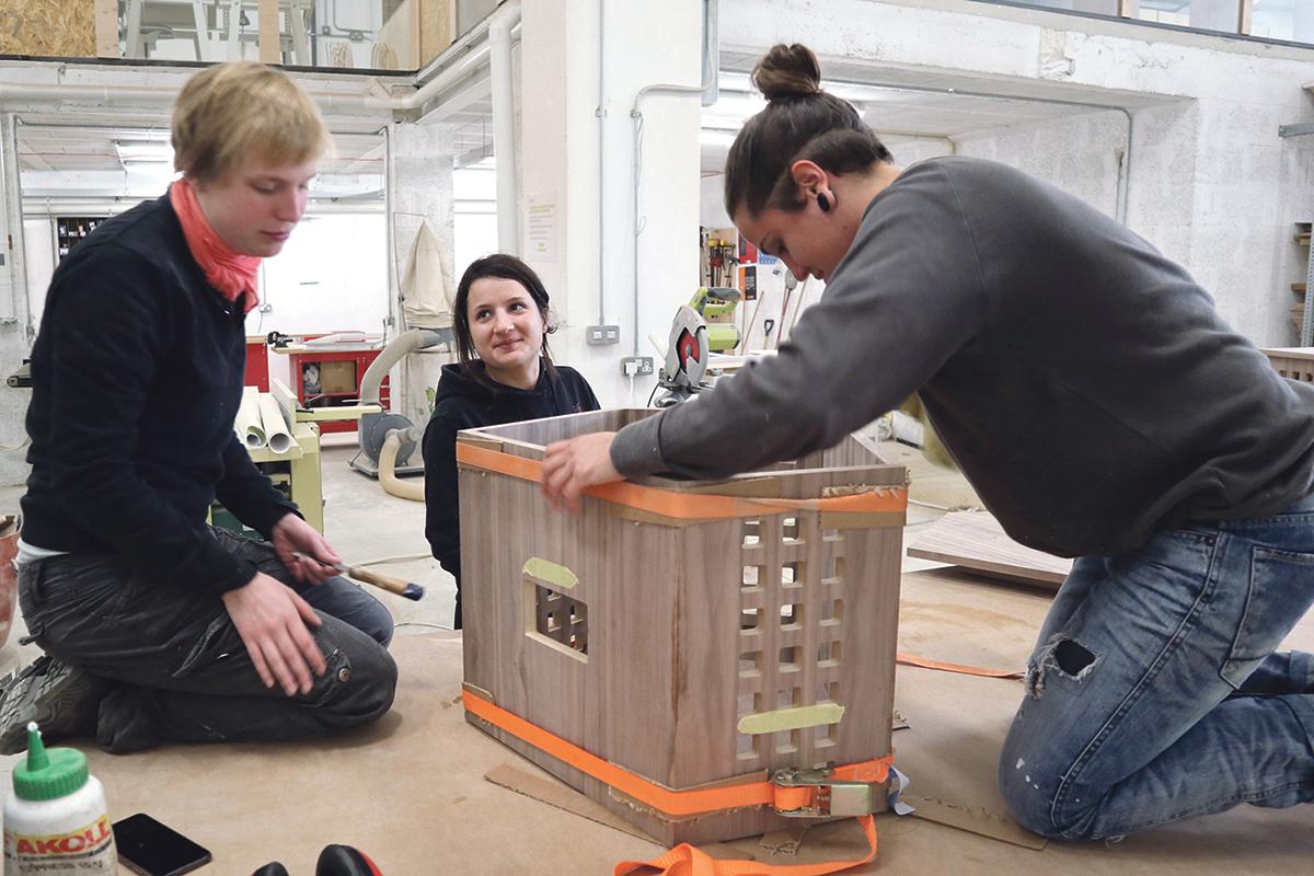 Working together on a bedside table.