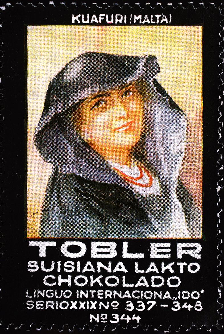 Tobler chocolate stamp. Woman in 'għonnella'