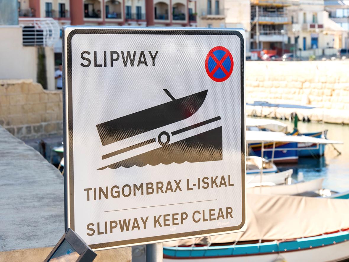 A metal sign in Maltese and English. Photo: Shutterstock.com