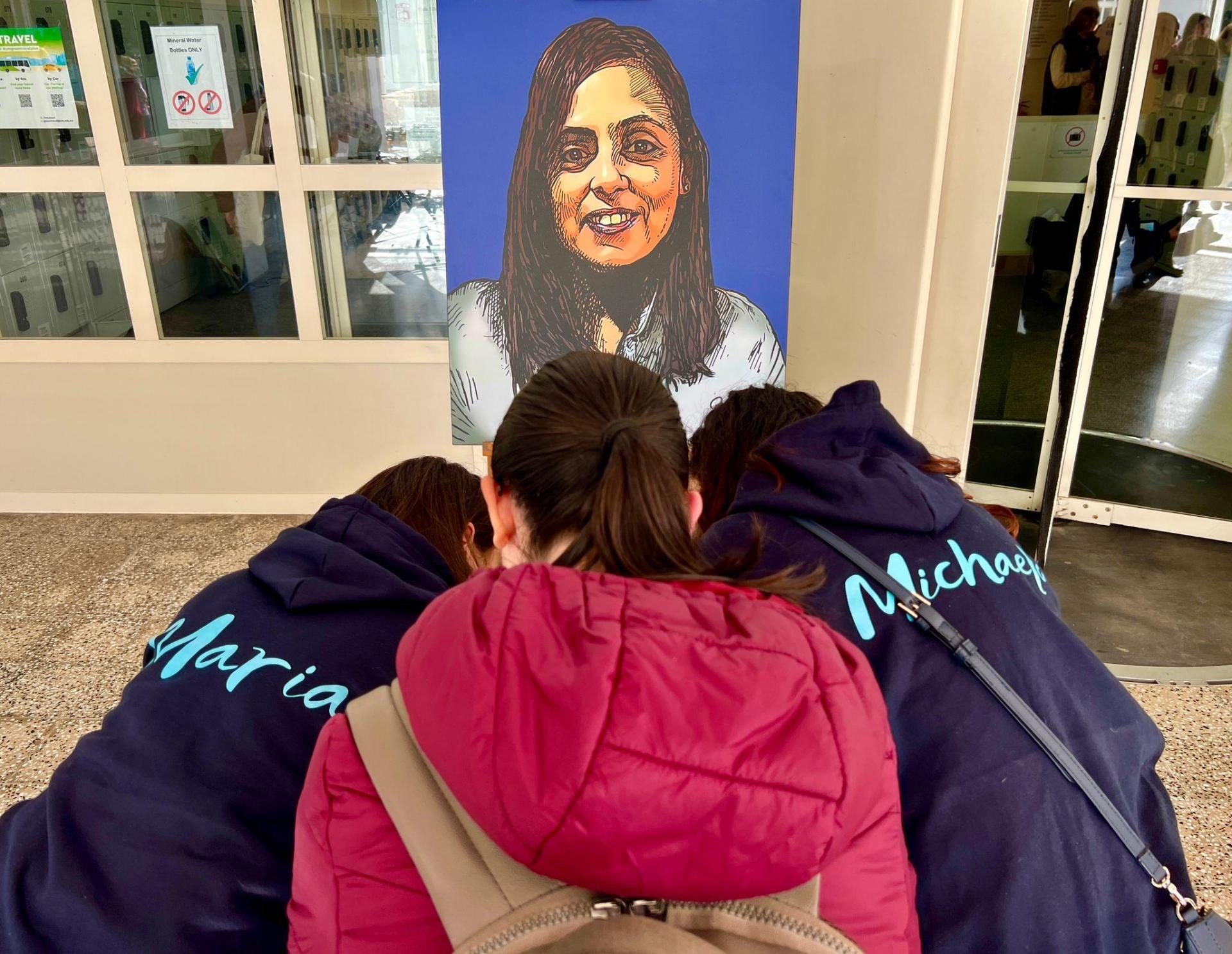 People sign a book of remembrance for Bernice Cilia at the University of Malta. Photo: Chris Sant Fournier