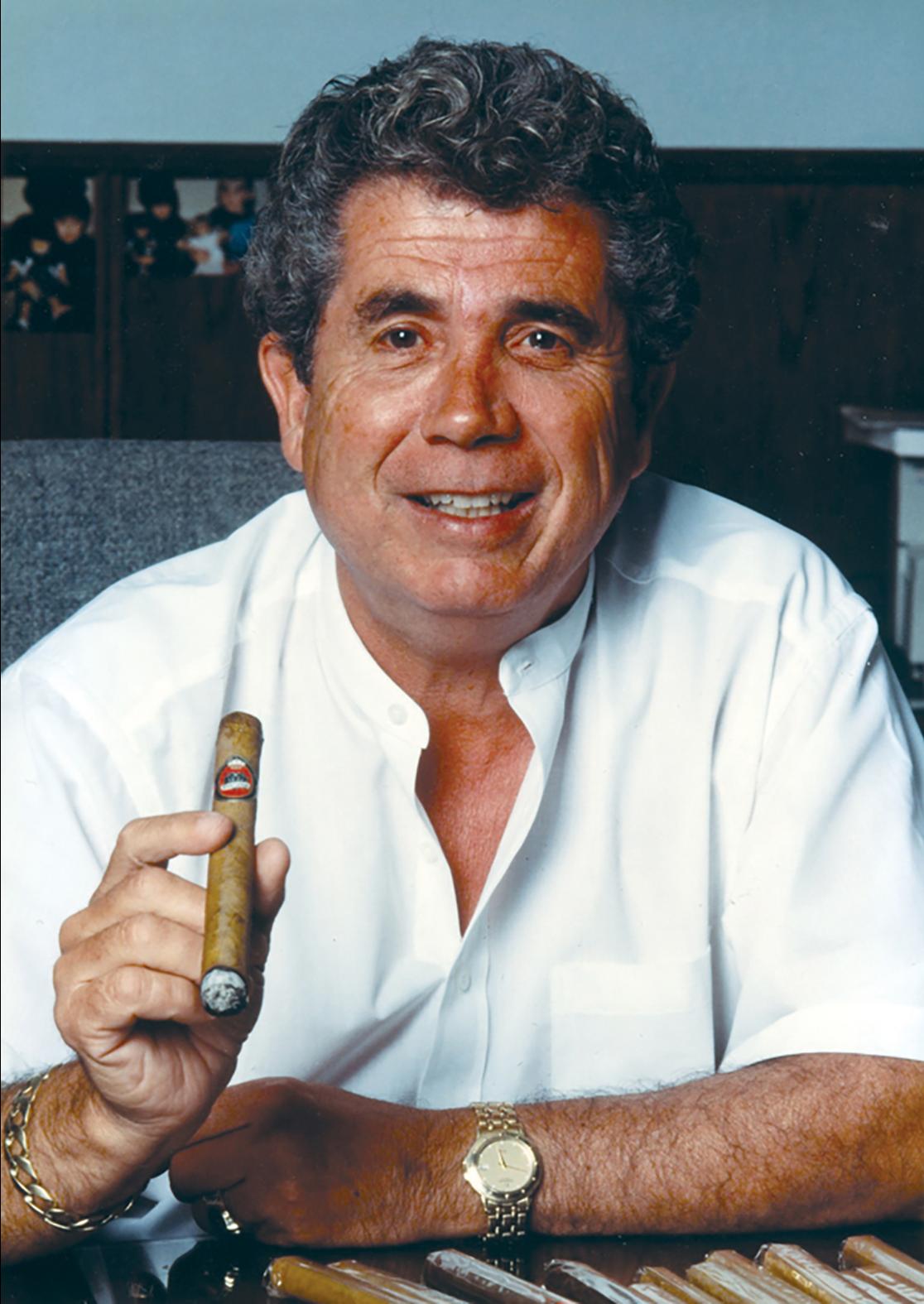 Hugh Cassar smoking one of his cigars. Photo: Kretek