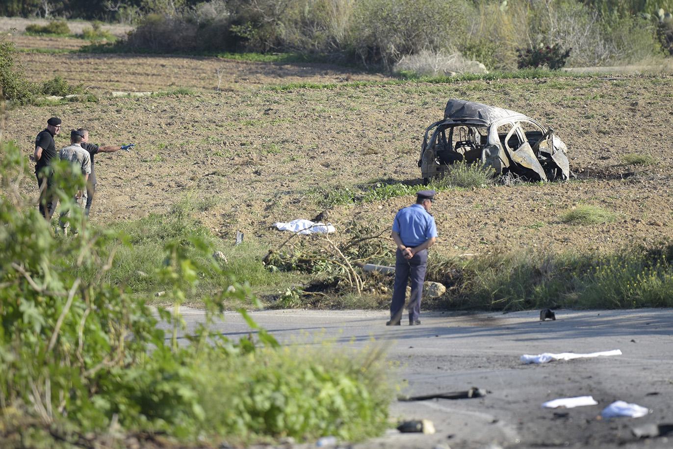 Investigators at the site of Caruana Galizia&rsquo;s assassination in 2016. File photo: Mark Zammit Cordina