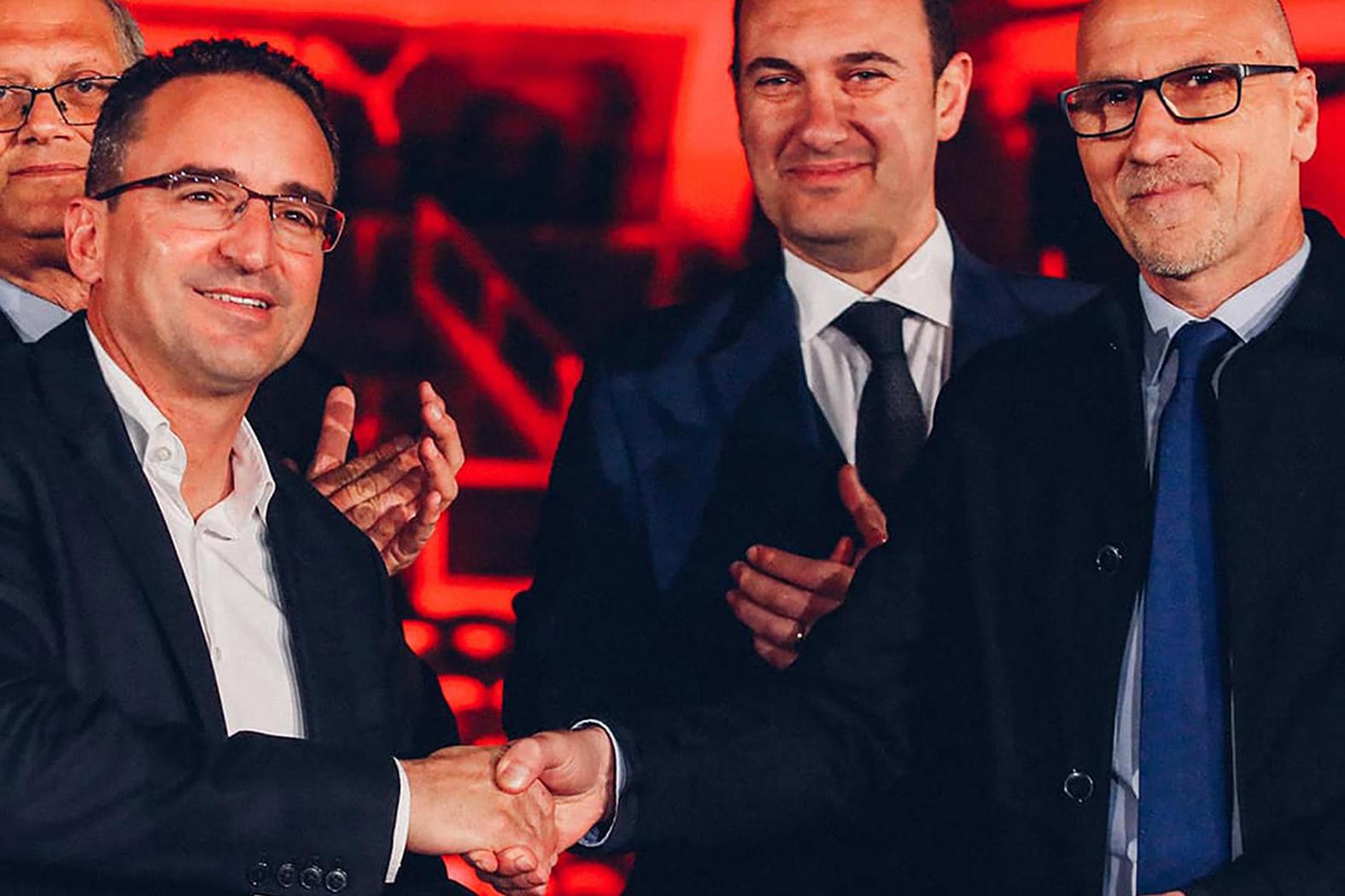 The minister presiding over the lease agreement with Ħamrun Spartans owner Joseph Portelli (left).