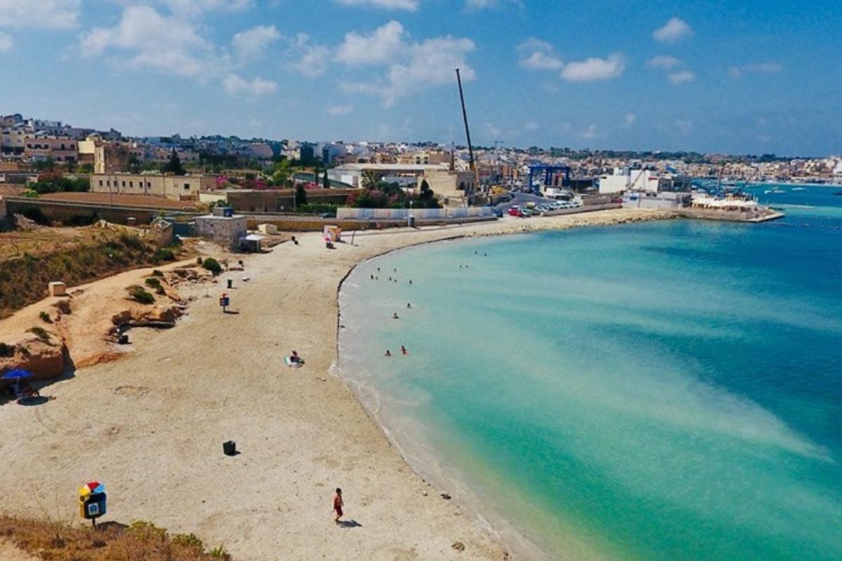 Għar l-Aħmar Bay, across the bay from the power station in Marsaxlokk, is to be enlarged using material from dredging. Times of Malta file photo.
