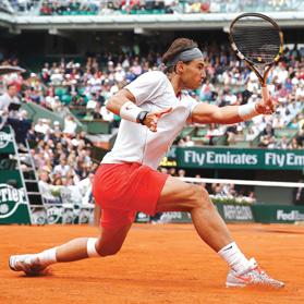 Rafael Nadal hits a return to Daniel Brands, yesterday.
