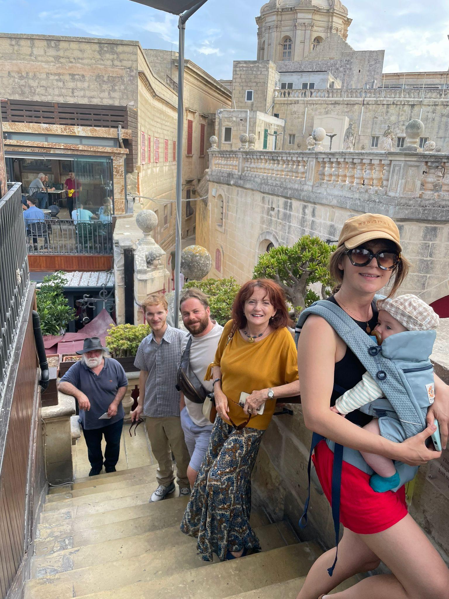 Xavier and his family in Mdina during a visit to Malta.