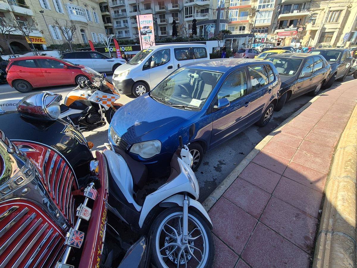 The bus crashed into a parked motorbike across the road.
