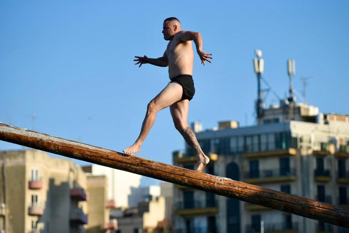 It's a tricky balancing act to run up the greasy, slippery pole. Photo: Chris Sant Fournier