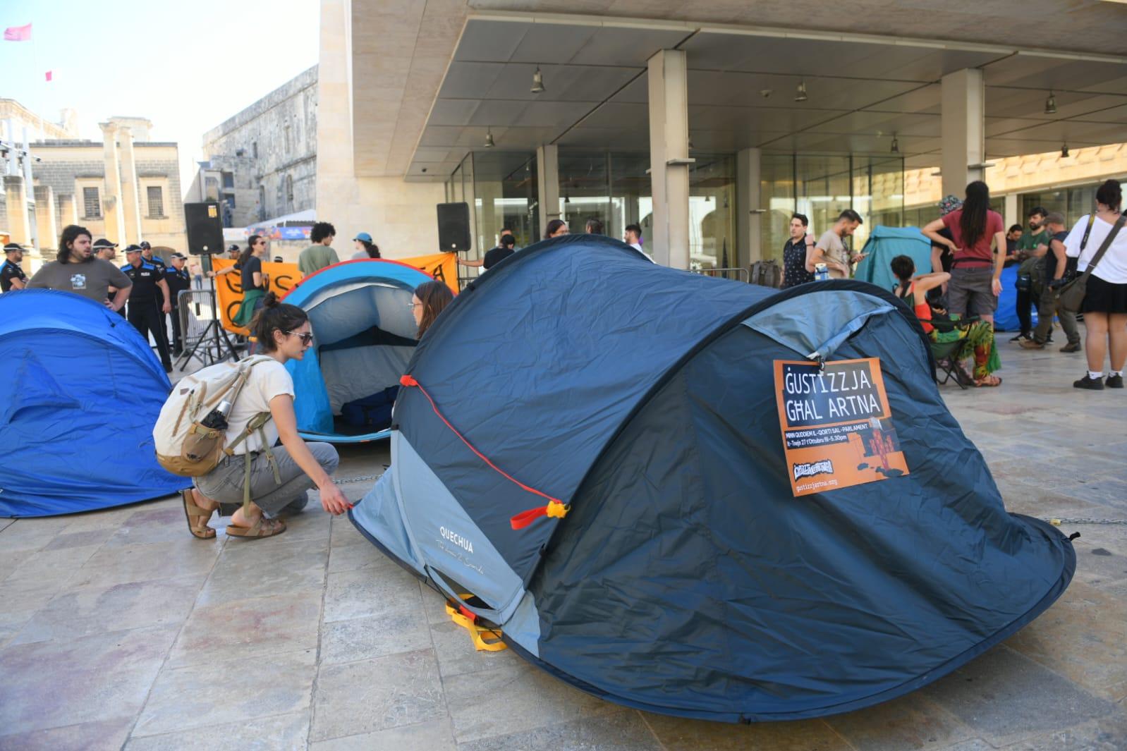 Activists set up two dozen tents within three minutes. Photo: Matthew Mirabelli