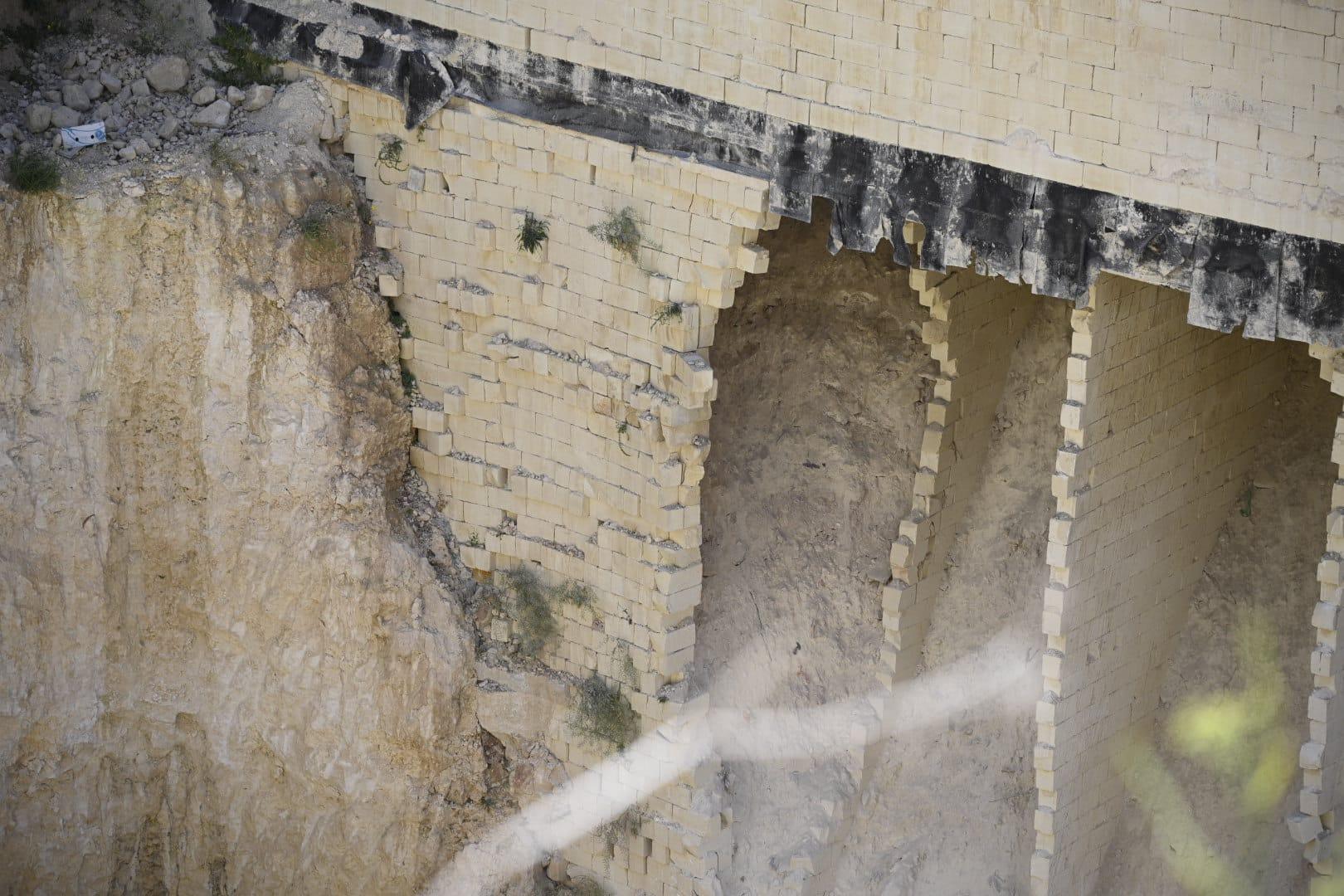 A wall collapse at a part of the site earmarked for garages sent authorities racing to the scene on Thursday night. Photo: Matthew Mirabelli.