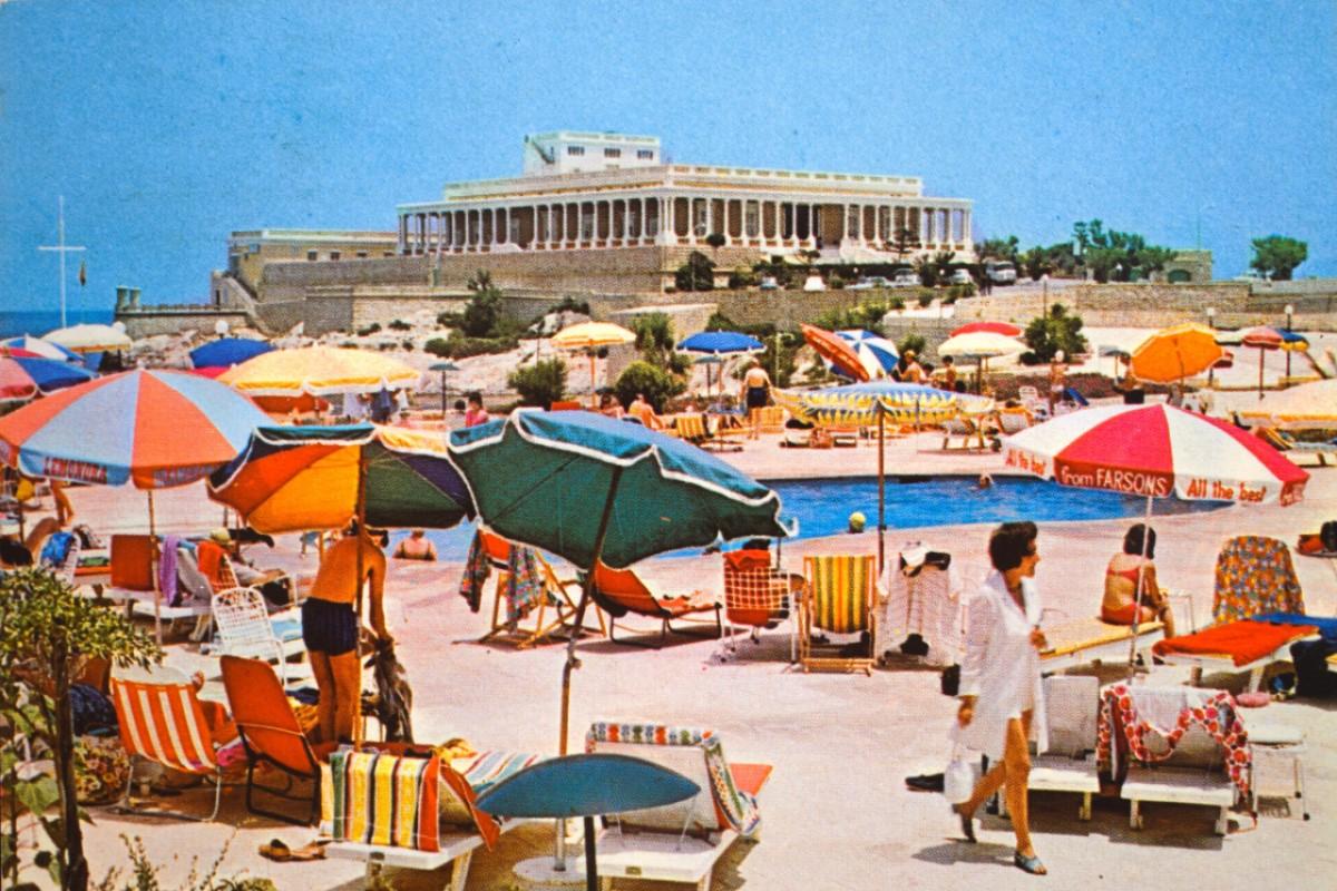 The Sheraton Hotel, Dragonara, promoted its beach amenities with this postcard.