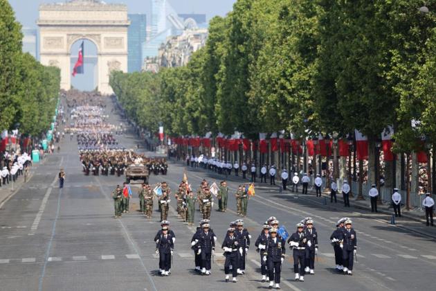 France flaunts firepower, unity with allies in military parade