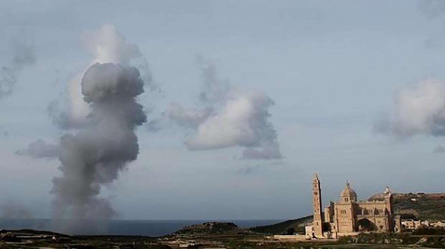 Plume of smoke towers over Ta&rsquo; Pinu church on November 4, 2010. Photo: Andrea Muscat