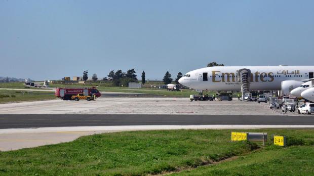 A fire truck parked close to the plane that caught fire. Photo: Mark Zammit Cordina