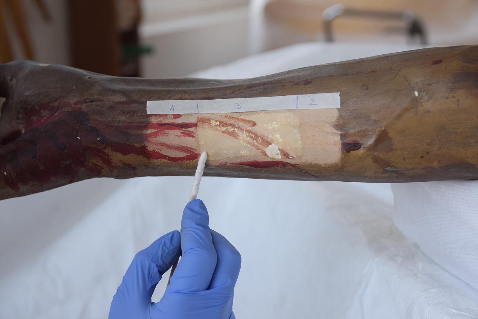 Initial cleaning tests carried out to study the distinctive polychrome layers.