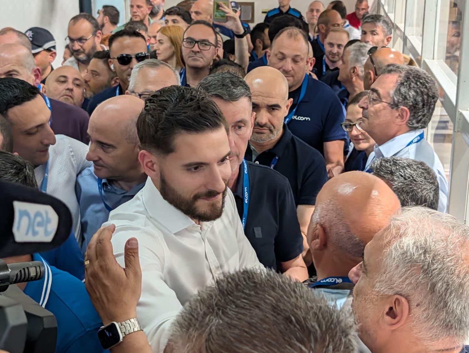 Alex Borg is greeted by PN agents at the Naxxar counting hall. Photo: Chris Sant Fournier