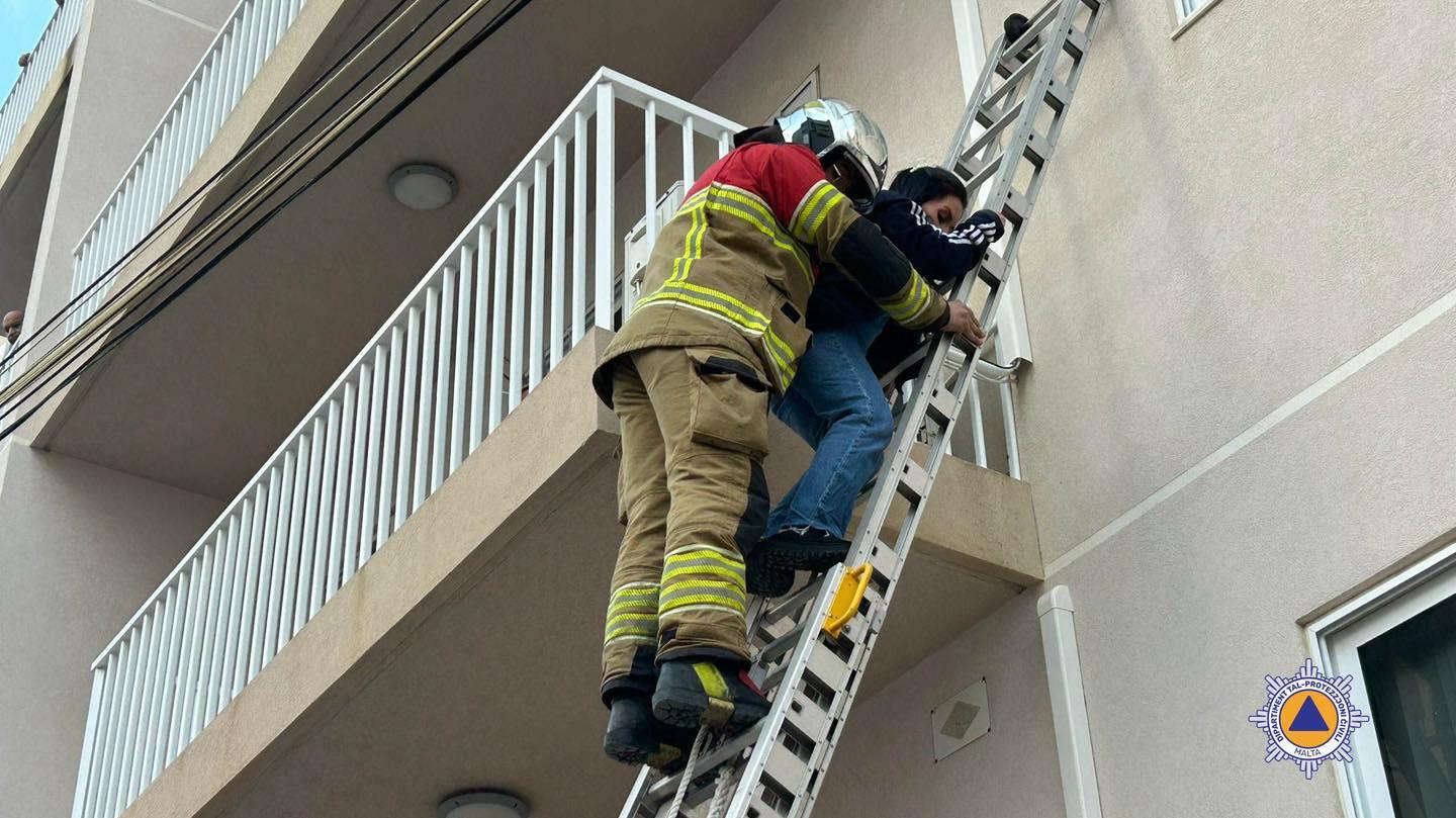 Residents were left trapped on their balconies as the fire raged in the common area of their apartment block. Photo: CPD