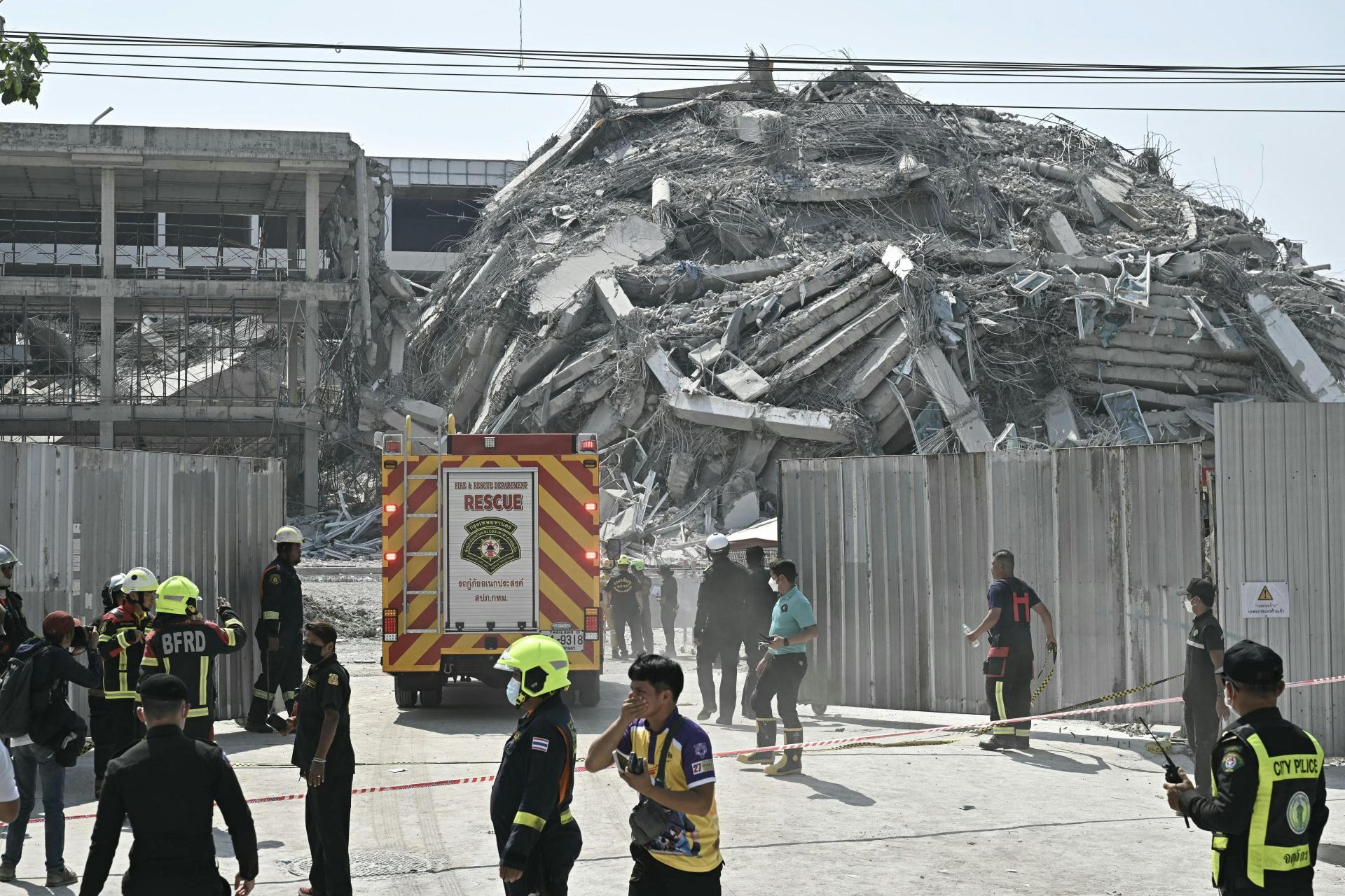 Rescue teams arrive at a construction site where a building collapsed in Bangkok. Photo: AFP