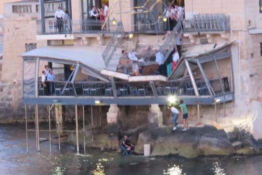 The moment the balcony collapsed. Photo: Dunstan Crockford
