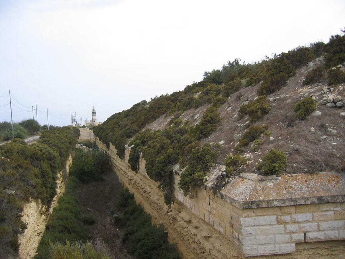 Part of the ditch at Fort Delimara, before its restoration and the clearance of the accumulated debris. Photo: Heritage Malta