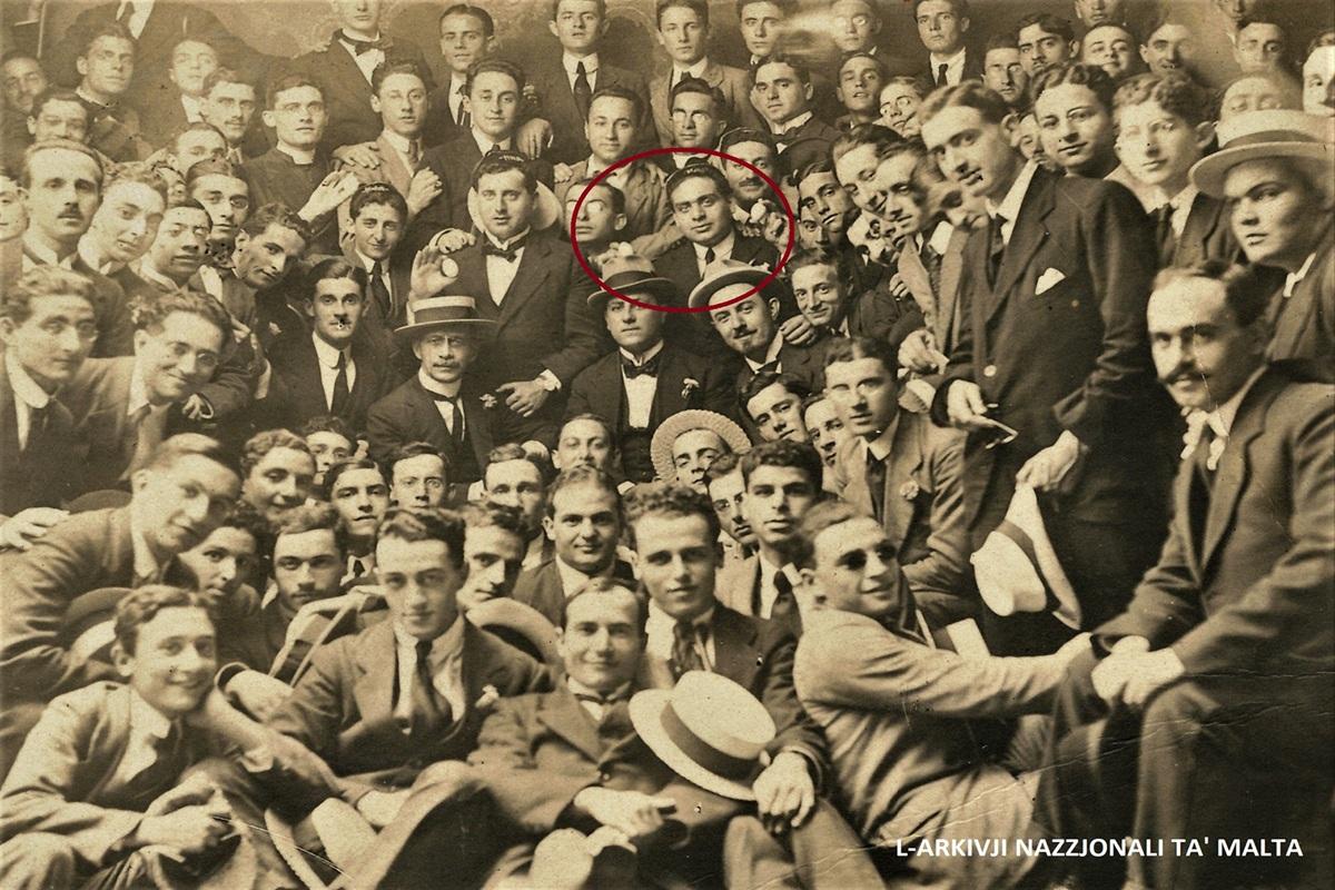 Group photo taken during the May 1919 student riots, including Carmelo Mifsud Bonnici (Il-Gross, circled). Several hold eggs to be thrown at Dr Francesco Azzopardi &lsquo;Ċikku il-Ħmar&rsquo;. Photo: National Archives of Malta