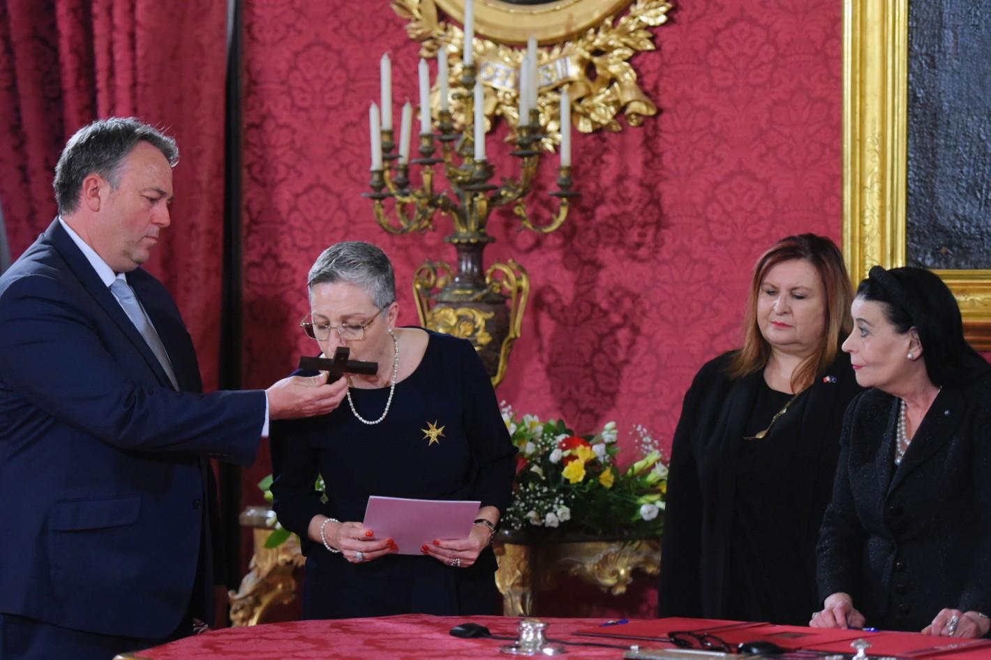 Brigitte Sultana is sworn in as judge by the state advocate.