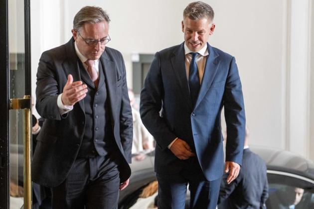 Hungary's PM in Brussels frozen funds talks with EU chief