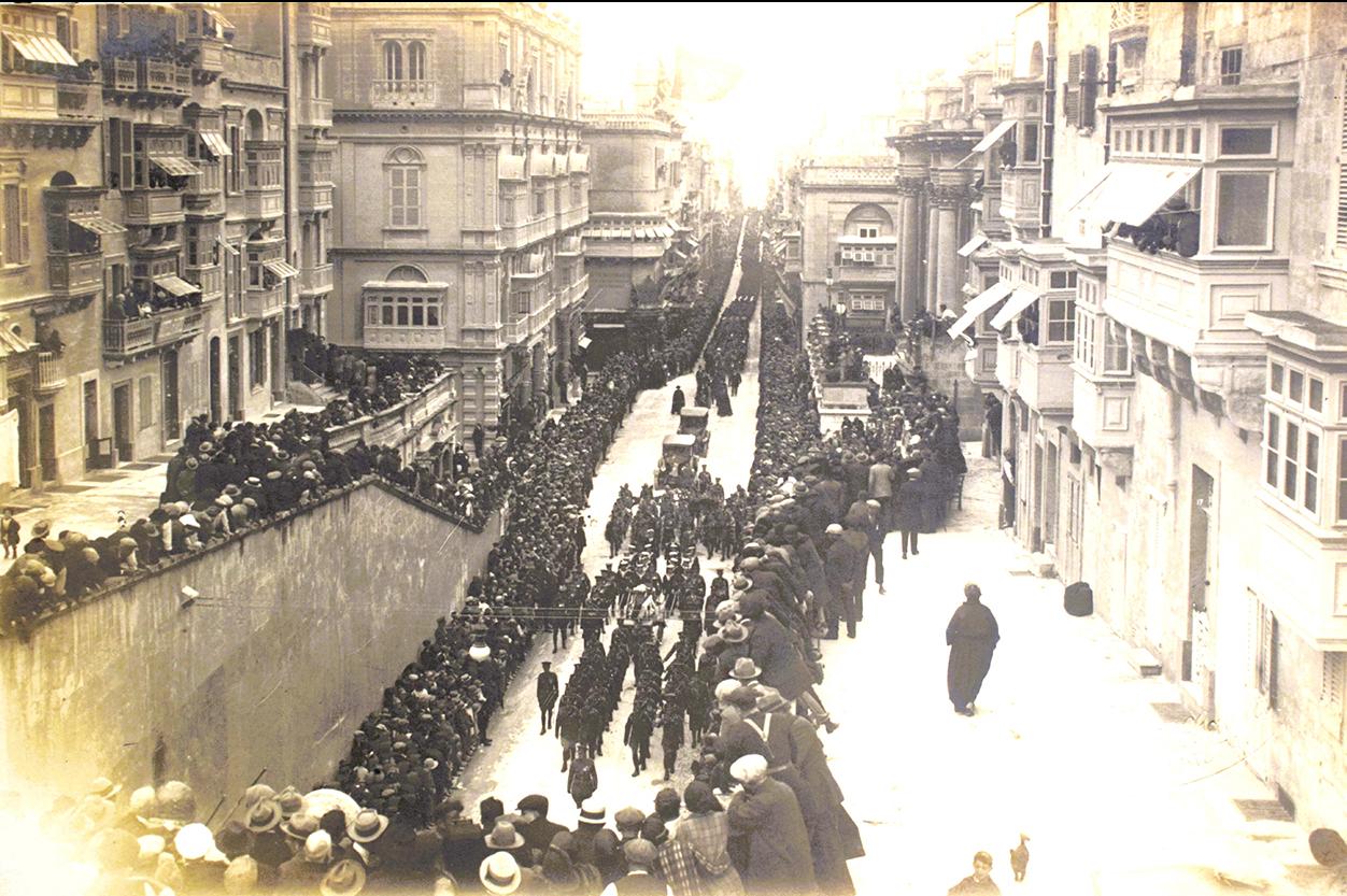 A Salvatore Lorenzo Cassar postcard of mourners at the Congreve funeral passing through Strada Reale.