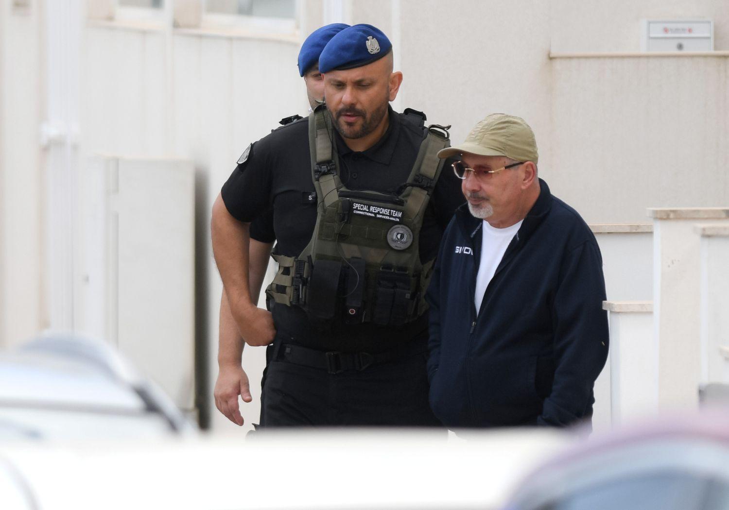 Vince Muscat, known as il-Koħħu (right) during a previous on-site inquiry.