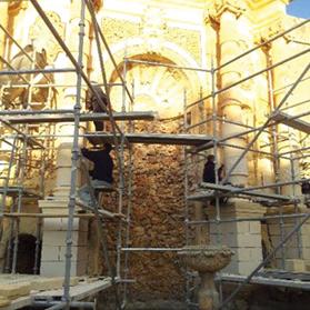 View of the columns being supported and newly replaced drums being sculpted on site.