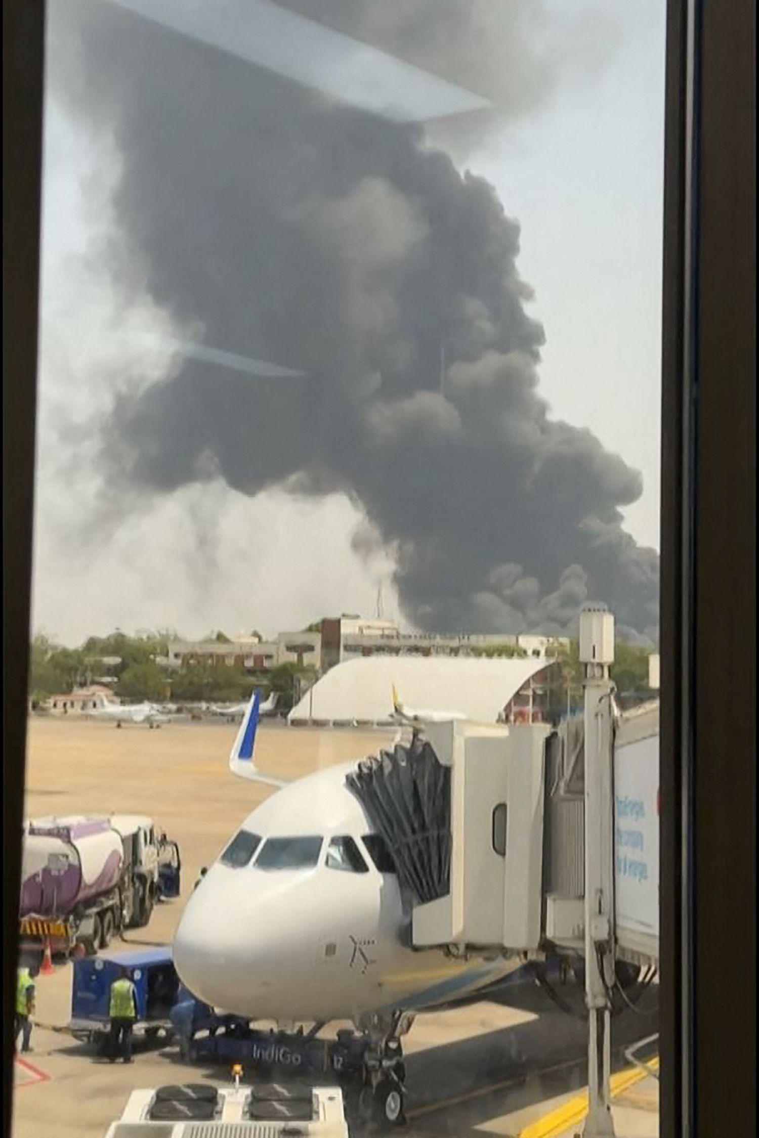 This frame grab from a video by @officialharshkataria shows the scene seconds after Air India flight 171 crashed. Photo: AFP