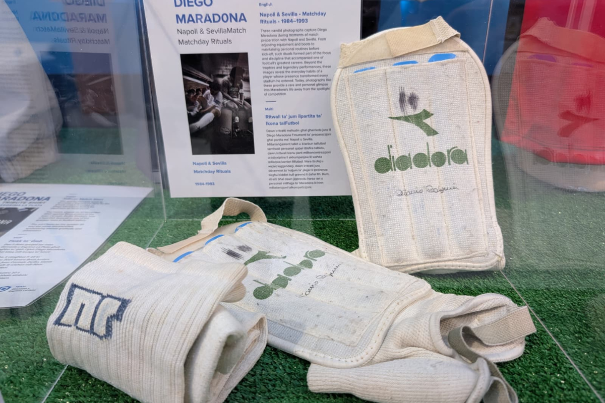 The footballers shin guards, alongside some information about Maradona's matchday rituals. Photo: Chris Sant Fournier