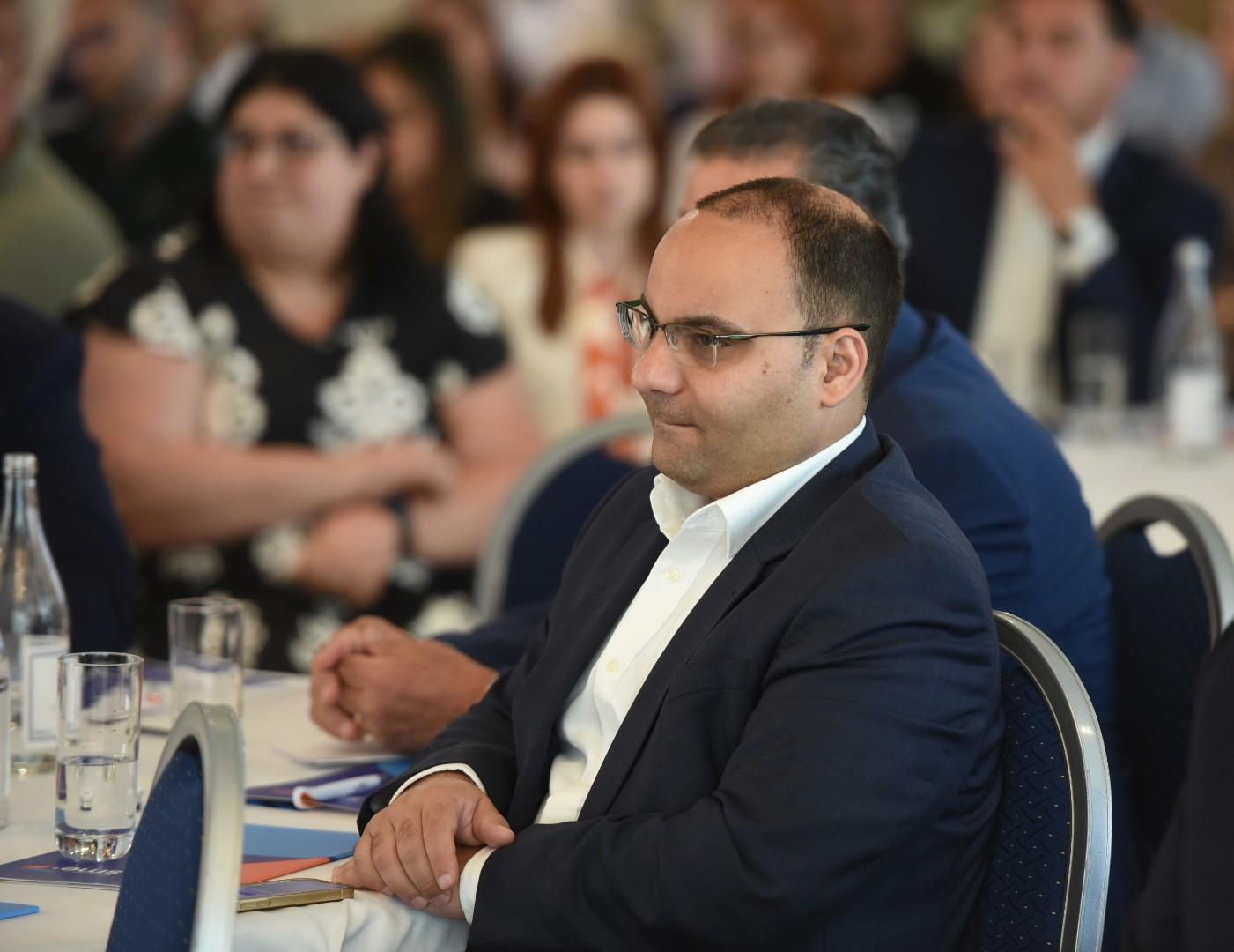 Clyde Caruana as just one of several cabinet and shadow cabinet members following the debate. Photo: Chris Sant Fournier