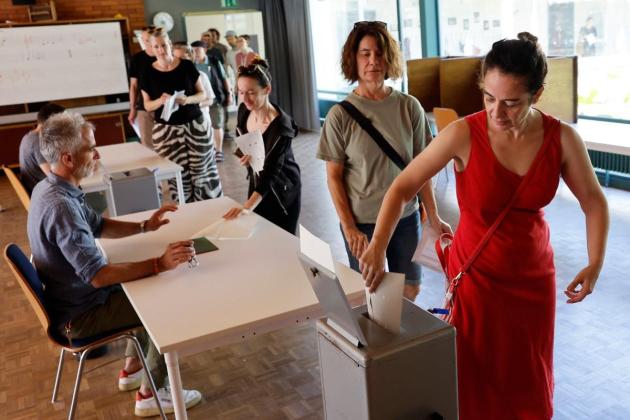 Swiss reject divisive anti-immigration proposal: projections