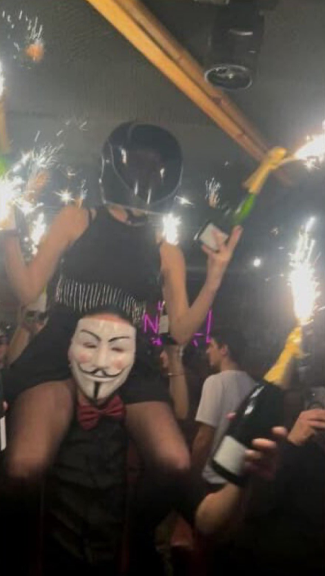 A second photo shows a woman in motorcycle helmet holding sparklers.