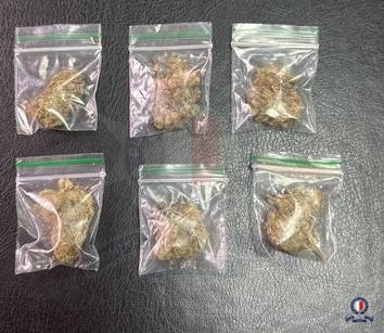 One of the men was caught with six sachets of suspected cannabis. Photo: Communications Office, Malta Police Force.