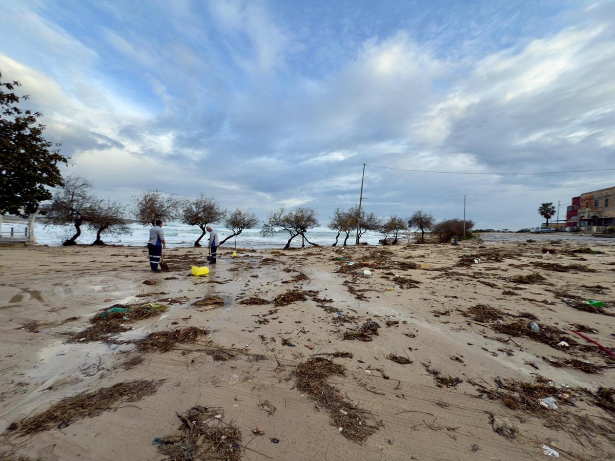 Public workers start their Wednesday morning by cleaning and removing the debris and rubbish swept across the car park in Baħar iċ-Ċaħaq. Photo: Jonathan Borg