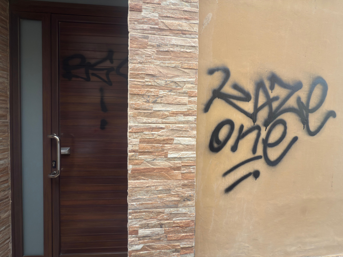 A vandalised front door and facade. Photo: Jonathan Borg