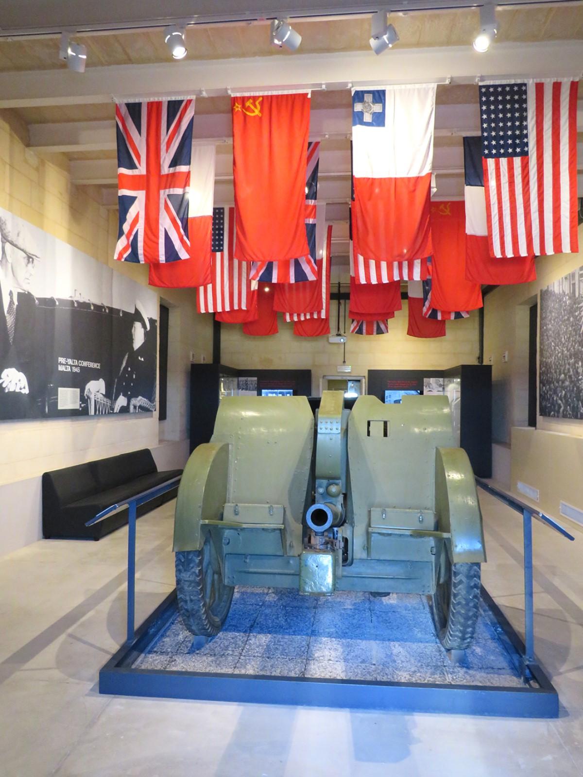 The flags of the victorious Allies and Malta hanging from the roof beams of the National War Museum. Photo: Heritage Malta &ndash; National War Museum