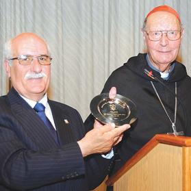 ALPS president George Stagno Navarra presenting Cardinal Prospero Grech with a silver plate as a memento of the reunion.