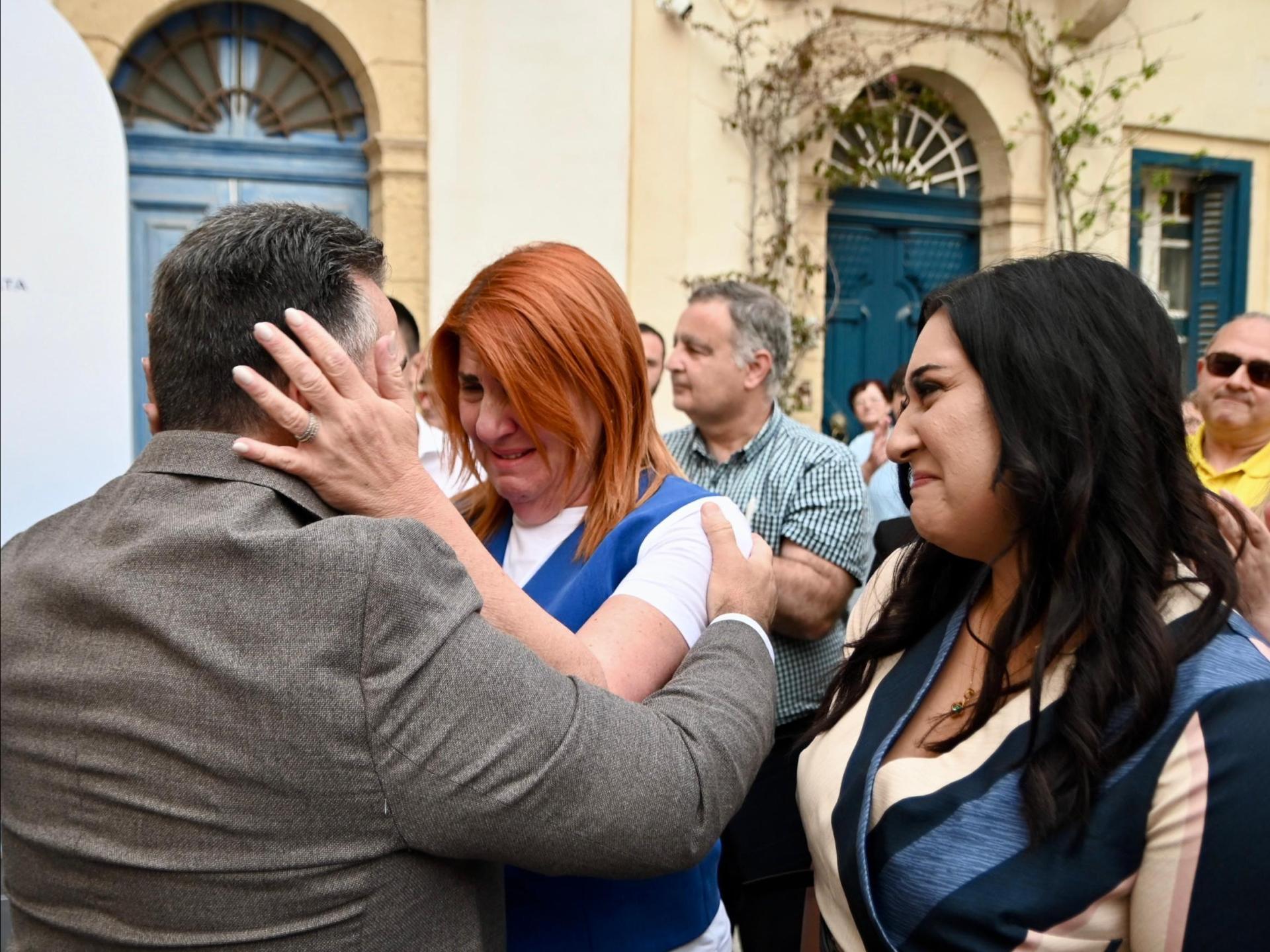 PN leader Grech greeting former mayor Gauci. Photo: Jonathan Borg
