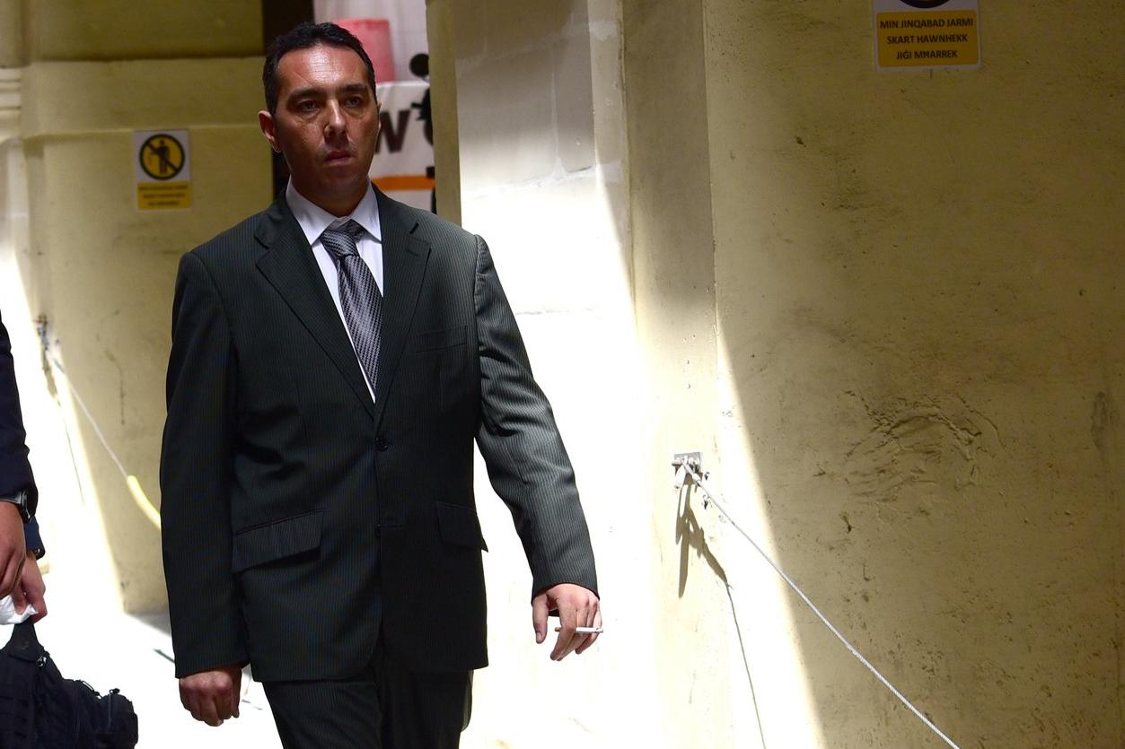Melvin Theuma leaving court in a part sitting.